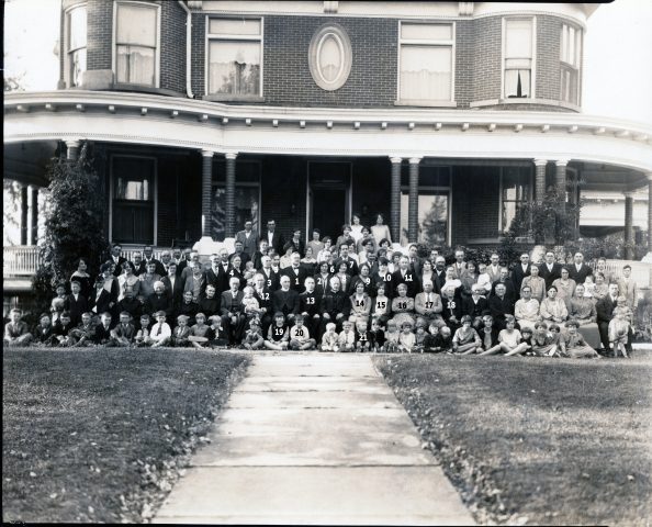 John W. and Cataherine Kleinhenz hold a family reuntion and celebration in their new home at 518 West Jackson Street in St Marys, Ohio, on September 30, 1928 in their new house.

Can you help identify others? Please contact Andy Niekamp at andyniekamp@gmail.com

1 - John W. Kleinhenz
2 - Catherine Kleinhenz (John W's wife)
3 - Anthony Kleinhenz (John W's brother)
4 - Anna Kleinhenz (Anthony's wife)
5 - Arnold Kleinhenz (John W's son)
6 - Raymond Kleinhenz (John W's son)
6 - Hilda Kleinhenz (John W's daughter)
7 - Alfred Kleinhenz (John W's son)
8 - Hilda Kleinhenz (John W's daughter)
9 - Mabel (Klosterman) Kleinhenz (Raymond's wife)
10 - Pauline Kleinhenz (John W's daughter)
11 - Leonard Kleinhenz (John W's son)
12 - George Thieman (Olive's husband)
13 - Father Sebastion Kremer (Alfrida's uncle)
14 - Olive (Kleinhenz) Thieman (John W's daughter) LIKELY
15 - Alfrida Kleinhenz (John W's daughter)
16 - Minnie Kleinhenz (John W's sister)
17 - George Klosterman (Mabel's father)
18 - Mary Ann (Schwieterman) Klosterman (George K's wife)
19 - Esther Kleinhenz (John W's daughter)
20 - Edwin Kleinhenz (John Ws son)
21 - Robert John Kleinhenz (Raymond's son)